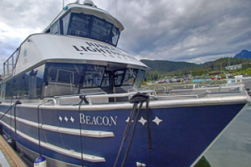 a boat docked at a dock